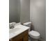 Small bathroom featuring a single sink vanity, toilet, and neutral paint at 5331 Yucatan Dr, Indianapolis, IN 46237