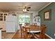 Inviting dining area with a round wooden table and chairs, perfect for Gathering meals and entertaining at 544 Everling Dr, Morgantown, IN 46160