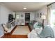 Cozy living room with comfortable seating, built-in shelving, and plenty of natural light at 544 Everling Dr, Morgantown, IN 46160