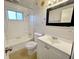 Neat bathroom featuring a tub, toilet, vanity, and sunflower accents at 5667 Broyles Rd, Avon, IN 46123