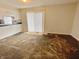 Dining room with sliding doors to the patio and partial view of the kitchen at 5667 Broyles Rd, Avon, IN 46123