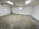 Spacious two car garage with concrete floors, providing secure parking and storage at 5667 Broyles Rd, Avon, IN 46123