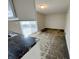 Kitchen with sliding glass doors to the patio and laminate countertops at 5667 Broyles Rd, Avon, IN 46123