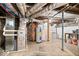 Unfinished basement with mechanicals and exposed brick foundation at 57 E South St, Mooresville, IN 46158