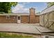 Brick home with shed and patio. Ample outdoor space for storage and recreational activities at 5749 Teresa Dr, Alexandria, IN 46001