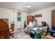 Cluttered bedroom with a window, desk, and boxes at 5749 Teresa Dr, Alexandria, IN 46001