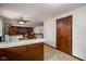 Kitchen area with open dining area, wooden table, and easy access to other rooms at 5749 Teresa Dr, Alexandria, IN 46001