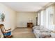 Living room with carpet, neutral walls, and large windows for natural light at 5749 Teresa Dr, Alexandria, IN 46001