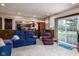 This living room offers seamless flow to the kitchen and access to outdoor spaces at 5749 Teresa Dr, Alexandria, IN 46001