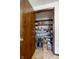 Walk-in pantry with shelving and ample storage space for food and supplies at 5749 Teresa Dr, Alexandria, IN 46001