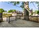 Multi-level wooden deck with built-in seating offering a great outdoor space with backyard views at 5760 Central N Ave, Indianapolis, IN 46220