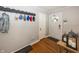 Welcoming entryway featuring a coat rack and decorative accents at 5829 Indianola Ave, Indianapolis, IN 46220