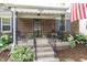Inviting front porch with seating, perfect for relaxing outdoors at 5829 Indianola Ave, Indianapolis, IN 46220