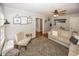 Bright living room featuring cozy seating and stylish decor at 5829 Indianola Ave, Indianapolis, IN 46220