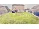 Spacious backyard features a well-maintained lawn and inviting patio area for outdoor enjoyment at 5924 Sable Dr, Indianapolis, IN 46221