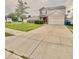 Charming two-story home featuring a well-manicured lawn and a spacious two-car garage at 5924 Sable Dr, Indianapolis, IN 46221