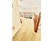 Hallway features wooden railing and neutral carpet, offers practical living space for daily routines and storage at 5924 Sable Dr, Indianapolis, IN 46221