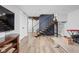 Finished basement with light wood flooring, open staircase and plenty of potential living space at 5946 Guilford Ave, Indianapolis, IN 46220