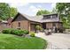 Wonderful home with a backyard patio, well-maintained lawn, and a charming brick exterior at 5946 Guilford Ave, Indianapolis, IN 46220