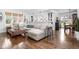 Comfortable living room with hardwood floors, a large sectional couch, and stylish decor at 5946 Guilford Ave, Indianapolis, IN 46220