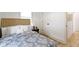 Cozy bedroom featuring a comfortable bed with stylish bedding and a neutral color palette at 6107 Broadway St, Indianapolis, IN 46220