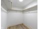 Spacious walk-in closet with white walls, modern flooring, and ample storage space at 6107 Broadway St, Indianapolis, IN 46220