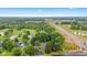 Aerial view showcasing the property's location near lush greenery and new construction at 6575 E 171St St, Noblesville, IN 46062