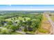 Aerial view of property featuring beautiful homes, mature trees and lush greenery at 6575 E 171St St, Noblesville, IN 46062