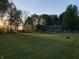 Spacious backyard with lush green lawn and storage shed at 6575 E 171St St, Noblesville, IN 46062