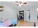 Bedroom with hardwood floors, a built-in closet, and calming paint at 6575 E 171St St, Noblesville, IN 46062