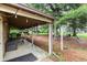 View of the backyard featuring a chicken coop, picnic table, and storage area at 6575 E 171St St, Noblesville, IN 46062