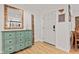Inviting foyer features wood floors, a decorative mirror and coat storage at 6575 E 171St St, Noblesville, IN 46062