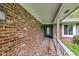 Welcoming front porch with brick flooring and an inviting entryway at 6575 E 171St St, Noblesville, IN 46062