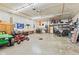 Spacious garage with high ceilings and ample room for storage and lawn equipment at 6575 E 171St St, Noblesville, IN 46062