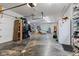Spacious garage with large open floor, lots of storage area and appliances at 6575 E 171St St, Noblesville, IN 46062