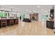 Open-concept living space with a cozy fireplace and seamless flow to the modern kitchen at 6575 E 171St St, Noblesville, IN 46062