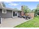 Relaxing backyard patio area complete with an outdoor fireplace and seating at 6575 E 171St St, Noblesville, IN 46062