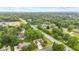 Aerial view featuring a neighborhood with mature trees, charming houses, and a clear street layout at 6980 White Oak Dr, Avon, IN 46123