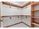 Spacious walk-in closet featuring built-in shelving and ample storage space at 6980 White Oak Dr, Avon, IN 46123