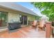 Spacious deck with an outdoor grill and rocking chairs, perfect for relaxing and entertaining at 6980 White Oak Dr, Avon, IN 46123