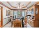 Dining room with tray ceiling, wood furniture, and decorative hutch, perfect for entertaining at 6980 White Oak Dr, Avon, IN 46123