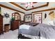 Spacious main bedroom with wood trim and ensuite bath is perfect for relaxation at 6980 White Oak Dr, Avon, IN 46123