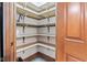 Walk-in pantry with shelving to maximize storage for food and kitchen essentials at 6980 White Oak Dr, Avon, IN 46123