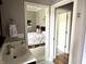 This bathroom features a view into the main bedroom as well as a separate room for the toilet at 7106 Royal Oakland Dr, Indianapolis, IN 46236