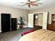 Spacious bedroom features a ceiling fan, neutral decor, and ample closet storage, providing a cozy retreat at 7106 Royal Oakland Dr, Indianapolis, IN 46236