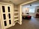 Inviting bedroom with a ceiling fan, neutral decor, and closet storage, creating a comfortable and functional space at 7106 Royal Oakland Dr, Indianapolis, IN 46236