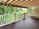 Charming deck with an awning, overlooking a manicured yard and a picturesque neighborhood, perfect for outdoor enjoyment at 7106 Royal Oakland Dr, Indianapolis, IN 46236