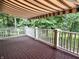 Picture of a deck with awning, offering an unobstructed view of the lush greenery and surrounding landscaping at 7106 Royal Oakland Dr, Indianapolis, IN 46236