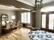 Formal dining room features wood floors, large table, decorative lighting and a view to the entry at 7106 Royal Oakland Dr, Indianapolis, IN 46236