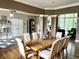 Elegant dining room featuring hardwood floors, classic chandelier, and stylish decor at 7106 Royal Oakland Dr, Indianapolis, IN 46236